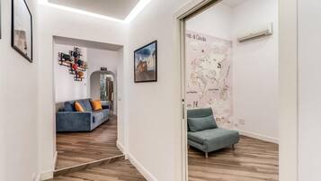 Deluxe Apartment, Balcony, City View | Living area | Flat-screen TV