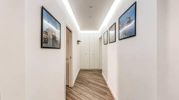 Deluxe Apartment, Balcony, City View | Living area | Flat-screen TV