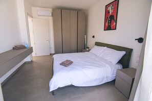 2 slaapkamers, een strijkplank/strijkijzer, gratis wifi, beddengoed
