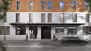 A modern hotel facade with a stone exterior and large windows. - Scarlatti Hotel Milano (Milan)