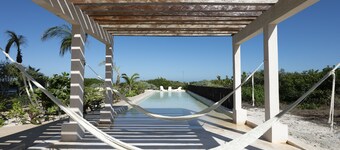 Spacious beachfront apartment with ocean views, private balcony & heated pool