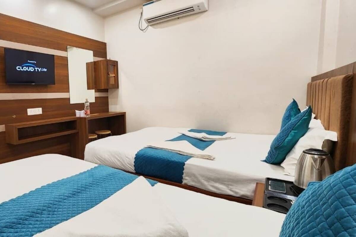 Shower, rainfall showerhead, towels, soap