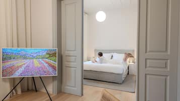 Deluxe Suite, Balcony, City View | Iron/ironing board, free WiFi, bed sheets