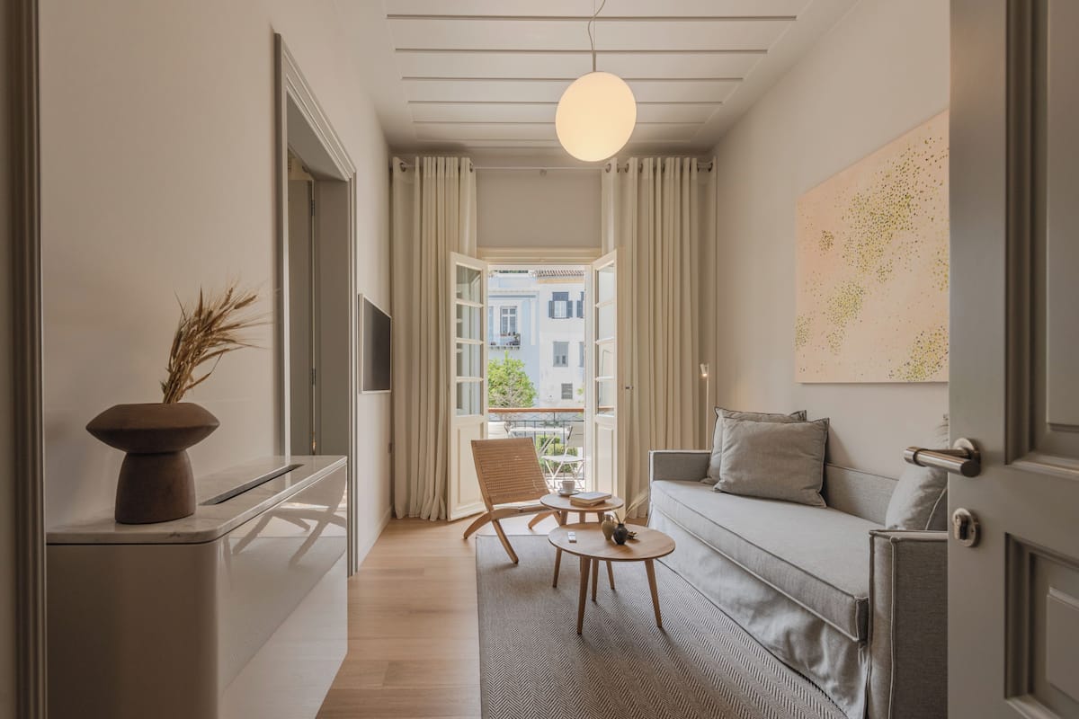 Deluxe suite, balkon, uitzicht op stad | Woonruimte