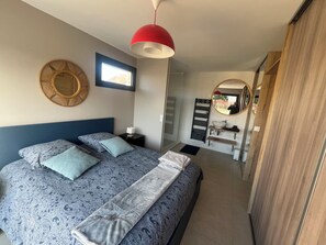 2 habitaciones, tabla de planchar con plancha, wifi y ropa de cama 