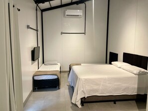 1 bedroom, bed sheets - Furnished Studio 1 (LUCAS DO RIO VERDE)