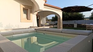 A swimming pool with a pergola and outdoor furniture. - Villa 21 - A - Two Bedroom Villa, Sleeps 4 (Budoni)