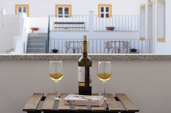 Suite, balcón, vistas al patio | Terraza o patio