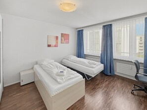 2 bedrooms, desk, iron/ironing board, travel cot