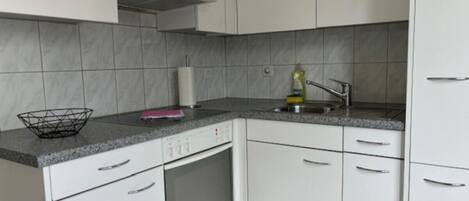 Oven, stovetop, coffee/tea maker, cookware/dishes/utensils