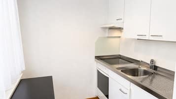 Placa de cocina, mesa de comedor