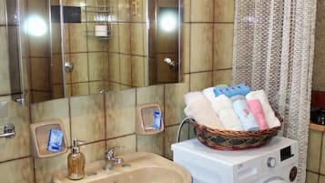 Hair dryer, bidet, towels, soap