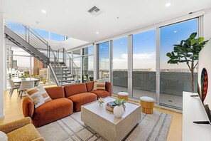 Apartment (2 Bedrooms) | Living area | 43-inch flat-screen TV with cable channels - @marbella Lane - Chic 2BR Penthouse w/ Ocean Views (Long Beach)