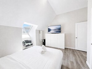 2 dormitorios, tabla de planchar con plancha, wifi y ropa de cama