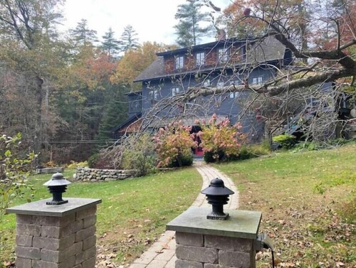 Cottage beside a waterfall