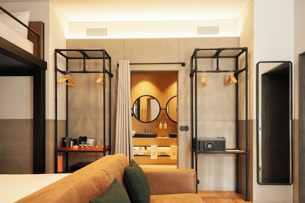 Suite familiar | 1 habitación, minibar, caja de seguridad en la habitación y escritorio