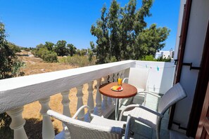 Comfort Triple Room, Balcony, Courtyard View | In-room safe, iron/ironing board, free WiFi - Finikas Santorini (Kamari)