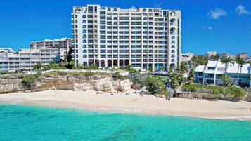 On the beach, sun loungers, beach towels
