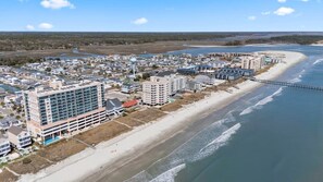 A coastal town with a beachfront hotel, a bridge, and a river. - Corner, Oceanfront Balcony- Pool- Upscale Design (North Myrtle Beach)