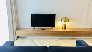 Appartement | Woonkamer | Een open haard