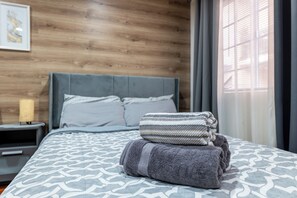 1 habitación, tabla de planchar con plancha, wifi y ropa de cama