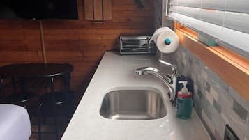 Fridge, microwave, coffee/tea maker, toaster