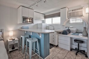 Fridge, microwave, coffee/tea maker, toaster