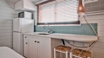 Fridge, microwave, coffee/tea maker, toaster