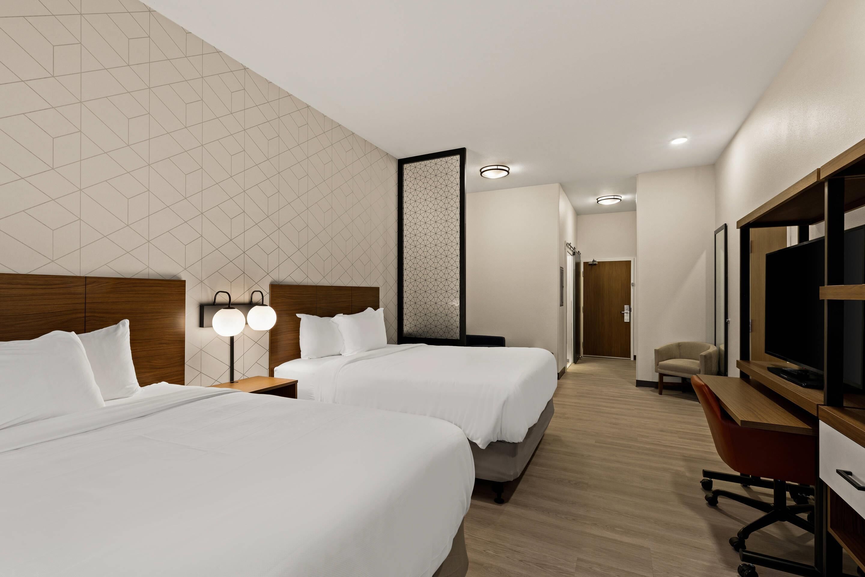 Habitación estándar, 2 camas Queen size, para no fumadores | Escritorio, espacio para trabajar con laptop y wifi gratis 