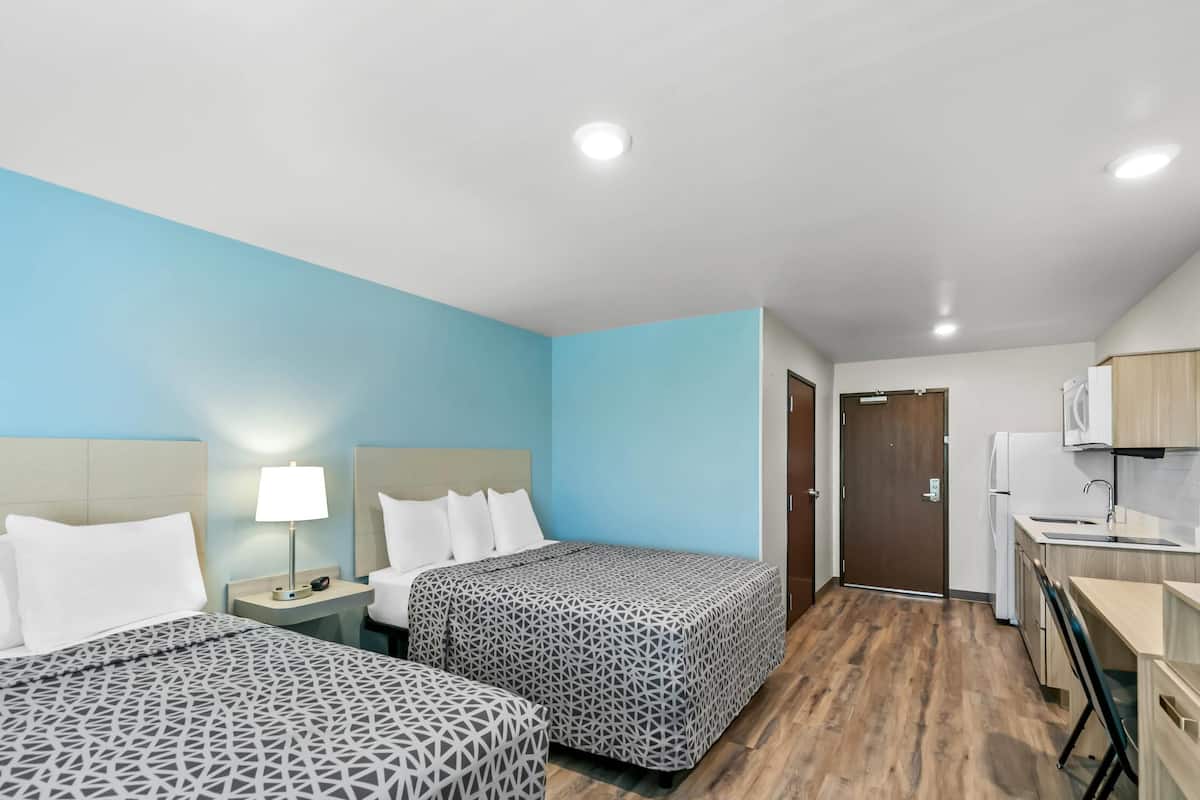 Desk, laptop workspace, blackout curtains, free WiFi