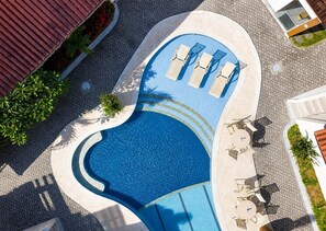Deluxe Villa | Pool | Outdoor pool, open 9:00 AM to 7:00 PM, sun loungers