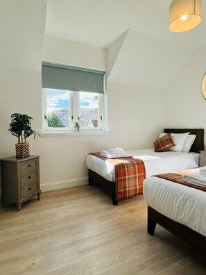 2 slaapkamers, een strijkplank/strijkijzer, reisbedje, gratis wifi