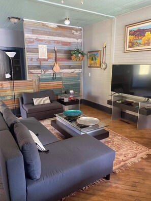 TV, fireplace, books, offices