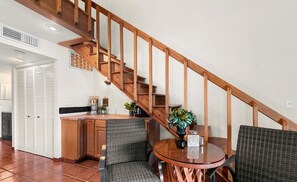 Enjoy cooking in this well-equipped kitchen with a central island, sink, and ample counter space.