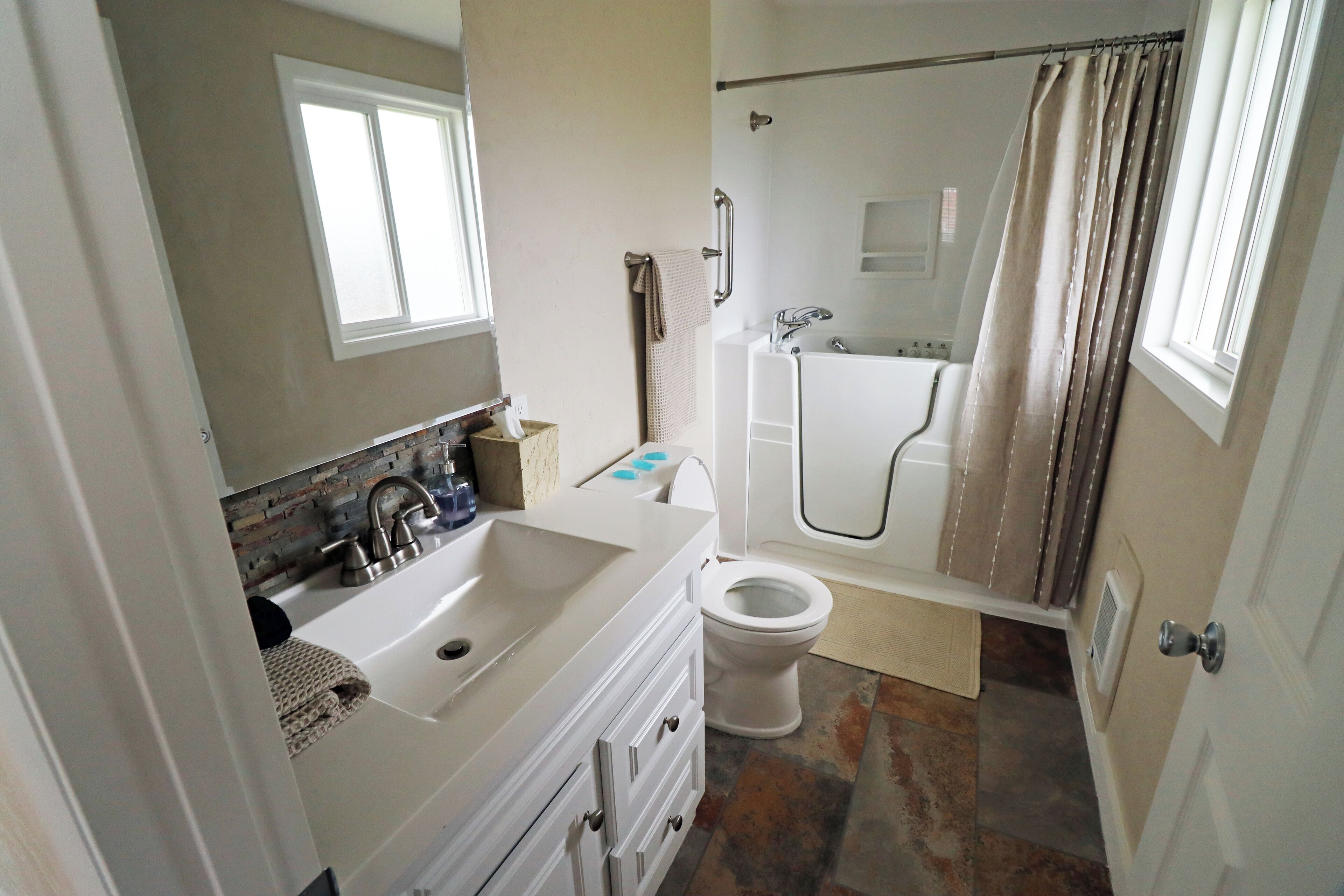 Shower, jetted tub, hair dryer, towels