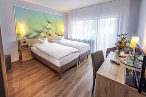 Habitación Confort con 1 cama doble o 2 individuales | 1 dormitorio, escritorio, espacio para trabajar con un portátil