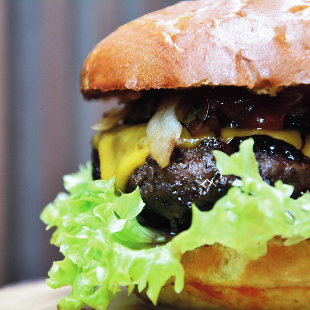 A sandwich with lettuce and a bun.