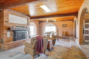 TV, fireplace, books