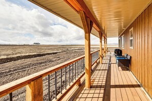 Terrace/patio - Wraparound Deck: Newly Built Home in Grangeville! (Grangeville)