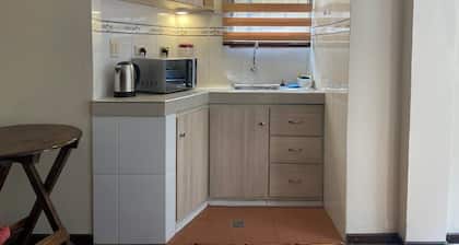 Private independent room with bathroom and kitchenette