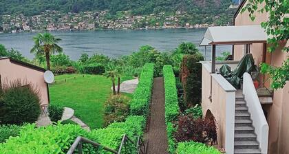 SUP APT rental with private beach at Lugano lake