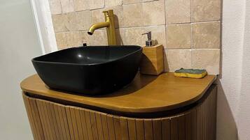 Hair dryer, towels, soap, toilet paper