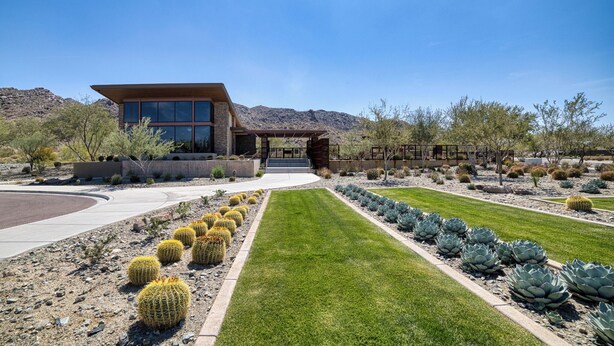 A modern house with a patio, surrounded by cacti and succulents, with mountains in the background. - Resort-Style Gated, Pool Gym Near Downtown Phoenix & Chase Field Hiking Mountain (Phoenix)