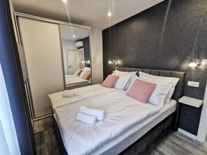2 habitaciones, tabla de planchar con plancha, wifi y ropa de cama
