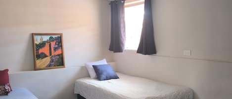 Basic Apartment, Balcony, Hill View | Blackout drapes, iron/ironing board