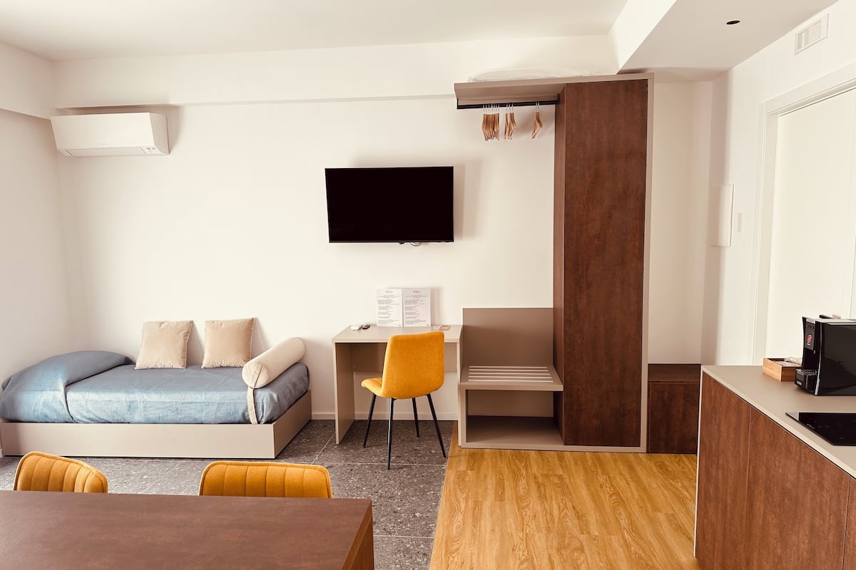 Superior Triple Room, Balcony, Courtyard View | Laptop workspace, free WiFi