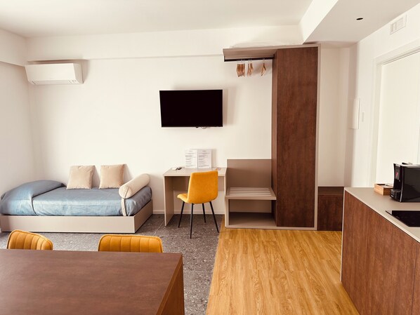 Superior Triple Room, Balcony, Courtyard View | Laptop workspace, free WiFi