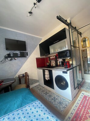 1 slaapkamer, een strijkplank/strijkijzer, wifi, beddengoed