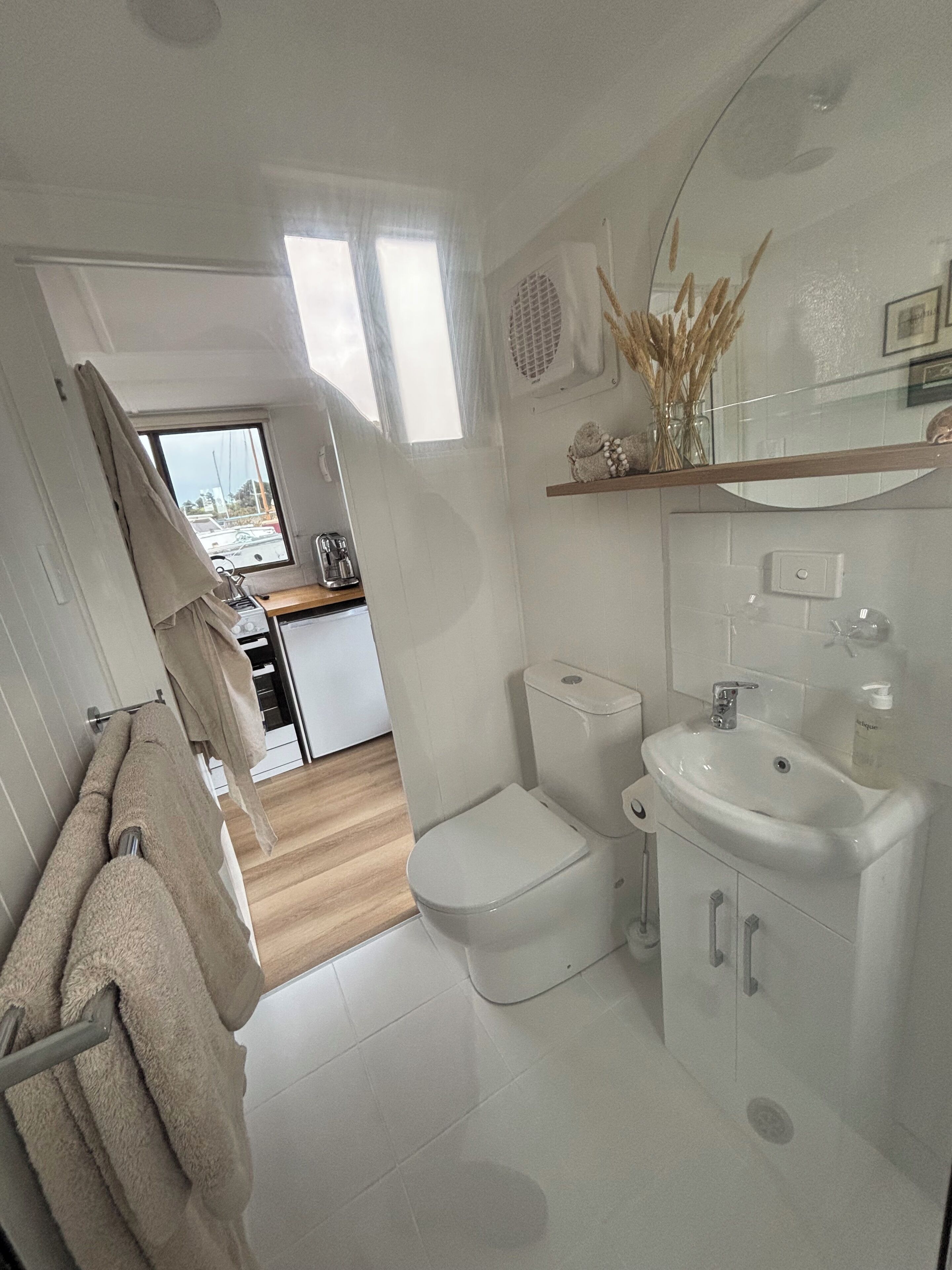 Shower, towels, soap, toilet paper