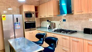 Fridge, microwave, oven, stovetop